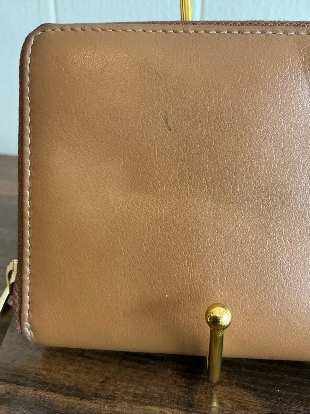 A rare vintage Adrienne Vittadini cognac color zip around leather wallet